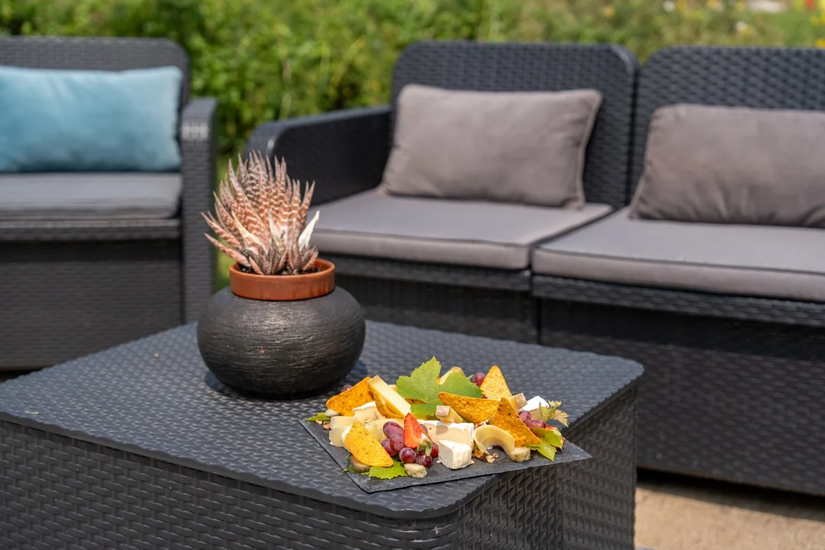 Platter of aged cheeses and fresh fruit served at the garden lounge