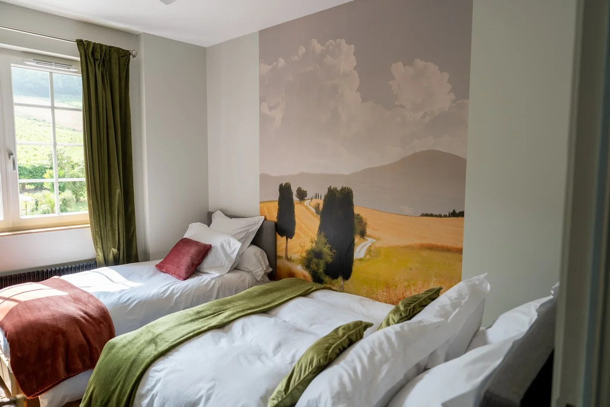 Chambre Saint-Rigaud — literie soignée et décoration raffinée